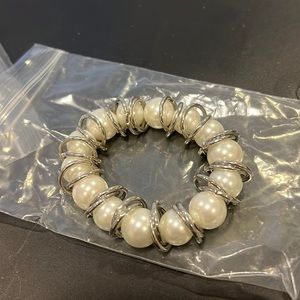 Brand new pearl and silver bracelet.